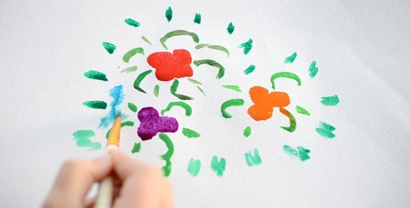 The Child Draws A Flower