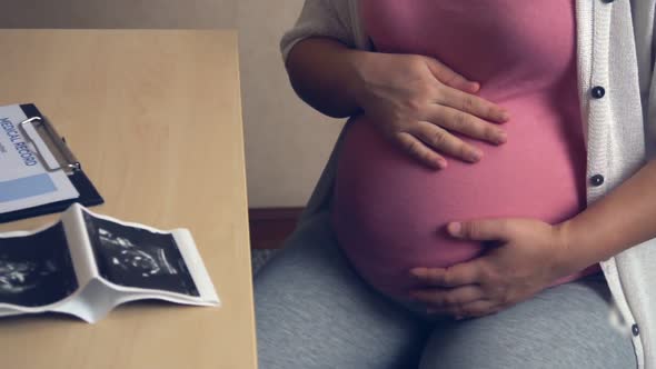 Pregnant Woman and Gynecologist Doctor at Hospital