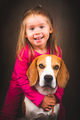 2 yeras old child hugging best friend dog. Happy childhood with pet Beagle. - PhotoDune Item for Sale