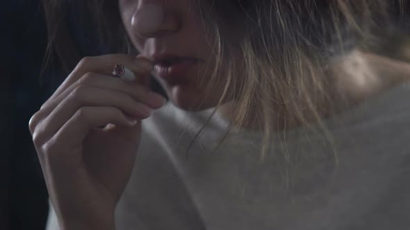 Depressed Disheveled Woman Smoking Cigarette and Crying, Substance Addiction