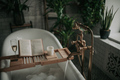 Luxury interior of eco style modern bathroom with oval bathtub and book on bamboo wood tray - PhotoDune Item for Sale