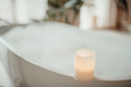Luxury interior of big bathroom at modern african style with oval bathtub in natural lighting - PhotoDune Item for Sale