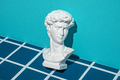 Statue of David's head in digital cyberspace.  - PhotoDune Item for Sale