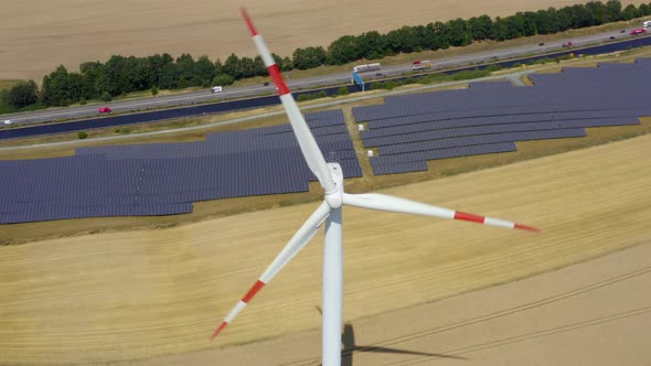 Solar power plant and Windmills aerial view. 