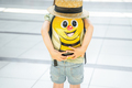 Girl with big funny backpack, bag in airport terminal. Waiting for boarding to flight. Happy  - PhotoDune Item for Sale