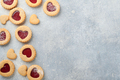 Traditional Linzer cookie with strawberry jam and powder sugar on light grey beautiful background. T - PhotoDune Item for Sale
