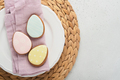Easter table setting. Easter dinner with multicolored easter eggs. Elegance pastel and pink tablesca - PhotoDune Item for Sale