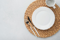 Vintage zero waste silverware. Rustic vintage set of white plate, wooden spoon and fork on napkin fo - PhotoDune Item for Sale