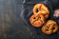 Bavarian pretzels and glass of lager beer. Oktoberfest food menu, traditional salted pretzels over o - PhotoDune Item for Sale