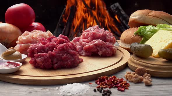 Ingredients for Homemade Burger Preparation Raw Minced Meat on the Wooden Board