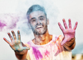 Man jumping with colored powder - PhotoDune Item for Sale