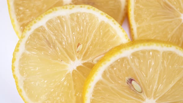 lemon close-up. rotating lemon slices close-up slow mo