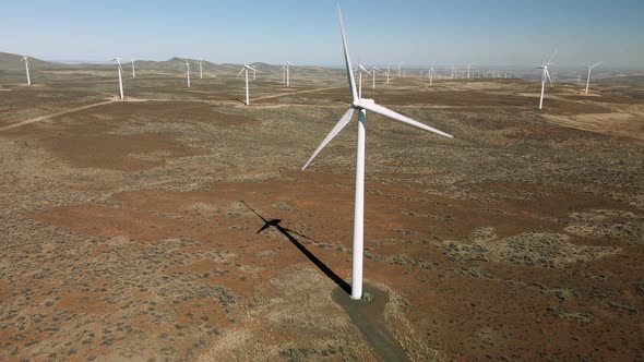 Drone Dolly Of Spinning Turbine Blades At Clean Energy Wind Farm