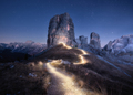 Flashlight trails on mountain path against high rocks at night - PhotoDune Item for Sale