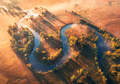 Aerial view of curving river in fog at sunrise in autumn - PhotoDune Item for Sale
