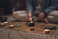Man lighting incense for meditation and spiritual practice - PhotoDune Item for Sale
