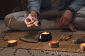 Man lighting incense for meditation and spiritual practice - PhotoDune Item for Sale