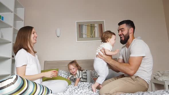 Young Parents Enjoying Weekend with Children