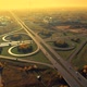 Beautiful Symmetrical Road Junction Cloverleaf Interchange Surreal Aerial Flight in the Early - VideoHive Item for Sale
