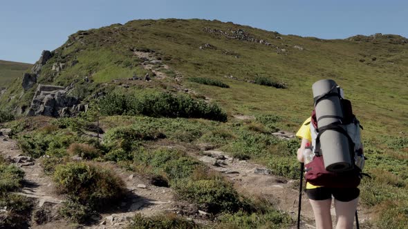 Woman Tourist walking on top of mountain. Hikers travel enjoy life scenic nature landscape