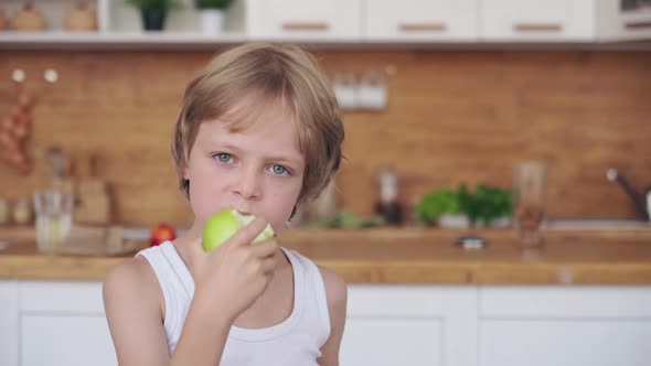 Funny Child Eating Apple