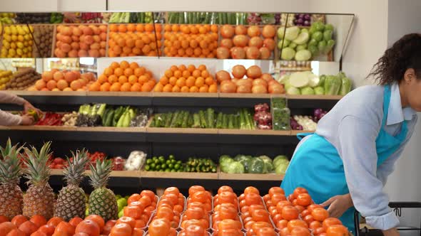 Positive Multiracial Couple Shopping in Farm Store