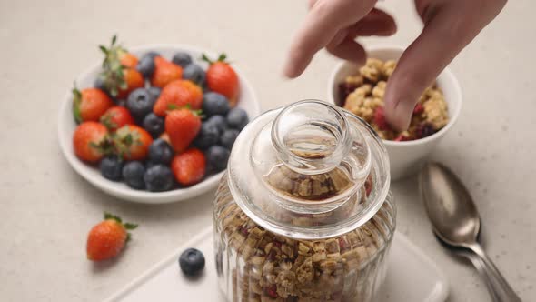 Glass jar with breakfast cereal