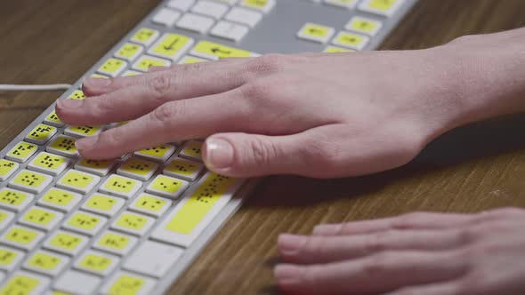 Closeup of a Computer Keyboard with Braille