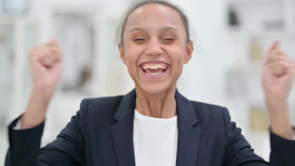 Portrait of Excited African Businesswoman Celebrating Success