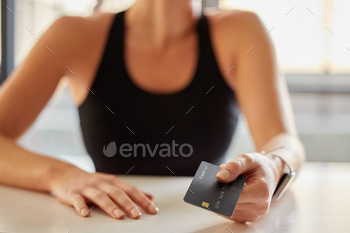 Hands, credit card and payment at gym for fitness membership or exercise subscription. Fintech, eco