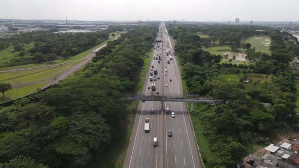 Aerial view of Indonesia Highway with busy traffic.