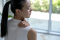 Woman has neck and shoulder pain - PhotoDune Item for Sale