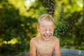 Happy little boy enjoying relaxing and splashing in water - PhotoDune Item for Sale