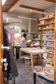 Woman with braided hair at her home art studio - PhotoDune Item for Sale
