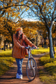Girl with bicycle at the park - PhotoDune Item for Sale