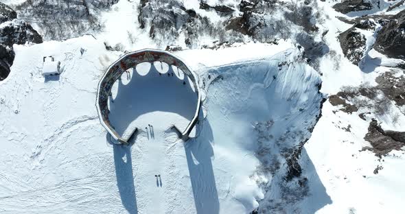 Gudauri, Georgia - February 22, 2022: Aerial view of Russia–Georgia Friendship Monument