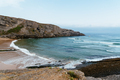 View of Antuerta Beach. Beach surrounded by cliffs and very popular for surfers - PhotoDune Item for Sale
