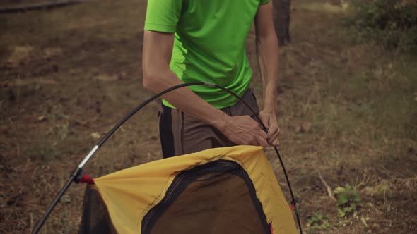 The Survivalist Sets Up a Tent