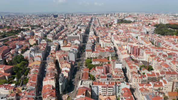 Wide Aerial Panoramic View of Colorful Houses with Orange Rooftops in Urban City Center of Lisbon