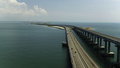 Aerial view of a bridge and a river or the sea. Shot. Long narrow bridge across the cities on a blue - PhotoDune Item for Sale
