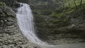 Beautiful waterfall stream pouring from cliff. Action. Picturesque waterfall with rock in forest - PhotoDune Item for Sale
