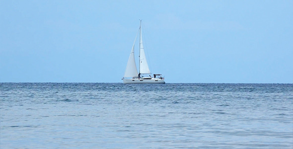 White Sail Yacht In The Morning Sea