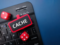 Keyboard and red dice with the word CACHE. Business concept - PhotoDune Item for Sale