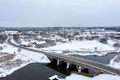 An old stone bridge with arches over the Abava river on a snowy winter day, Kandava, Latvia - PhotoDune Item for Sale