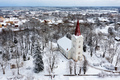 top view of the Lutheran Church in the Latvian small town of Kandava on a snowy winter day - PhotoDune Item for Sale