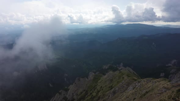 Fly Through The Clouds Over The Rocky Mountains