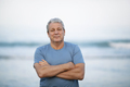 Portrait of a senior man on blurry sea background - PhotoDune Item for Sale