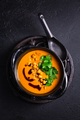 Creamy Pumpkin cream soup with pumpkin seed oil, baked chickpeas and cilantro - PhotoDune Item for Sale