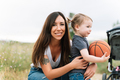 Mother and little girl with a basketball ball outdoors - PhotoDune Item for Sale