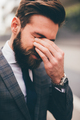 Frustrated and exhausted young bearded businessman - PhotoDune Item for Sale